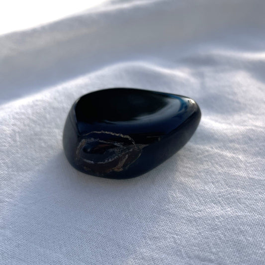 FALKENAUGE Trommelstein