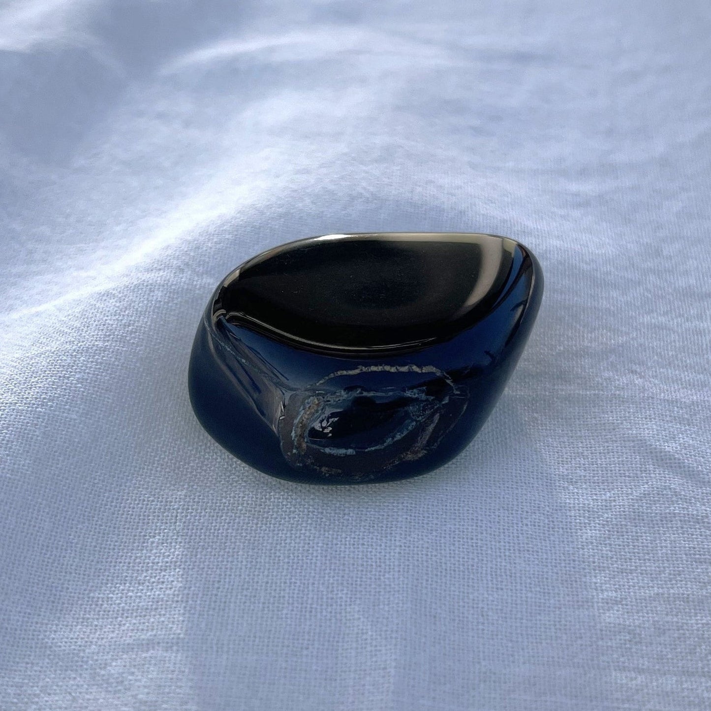 FALKENAUGE Trommelstein