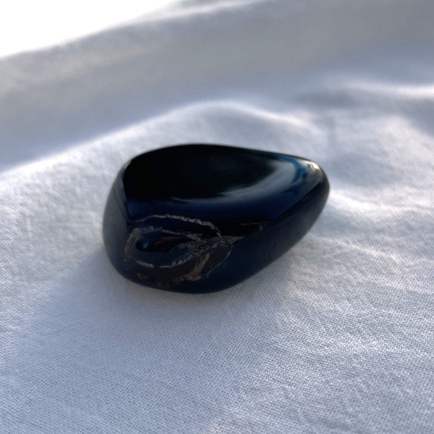 FALKENAUGE Trommelstein