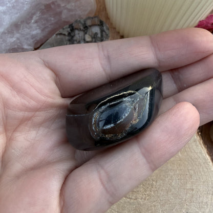 FALKENAUGE Trommelstein